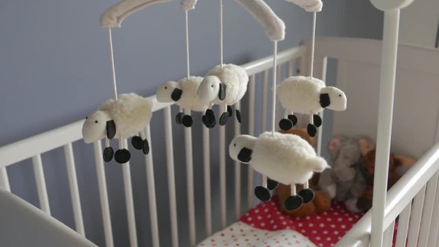 Mobile with Sheep, spinning above crib