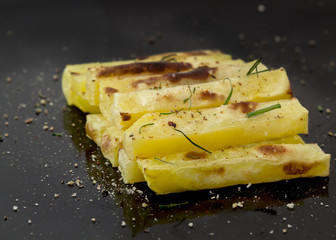 French fries on black background