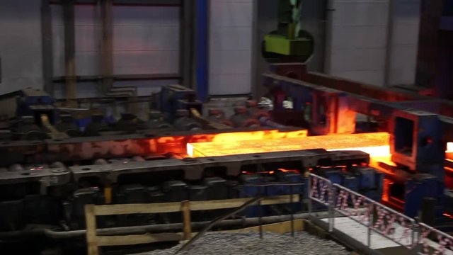 Hot rolled steel. Fresh cast hot metal slab.