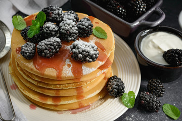 Pancakes with blackberries.