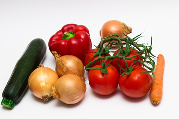 Morov, onion, zucchini, tomato, red bell pepper, on white background.