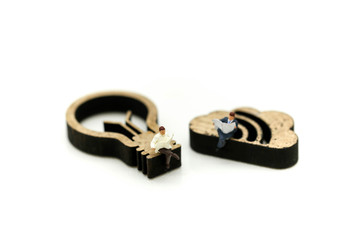 Miniature people : reading a book with sign of lamp idea and world map,Education business concept.