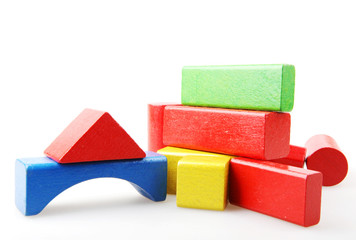 Wooden building blocks isolated on white