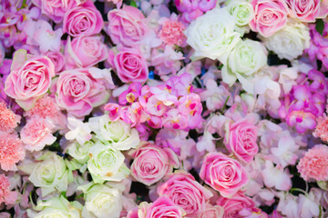 Obraz na płótnie Canvas Beautiful artificial pink flowers for background.