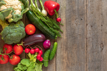 Fresh vegetables on wooden background. Top view, Copy space.