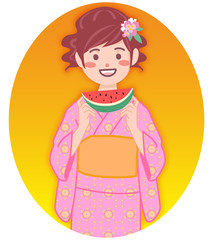 浴衣を着てスイカを食べる女性