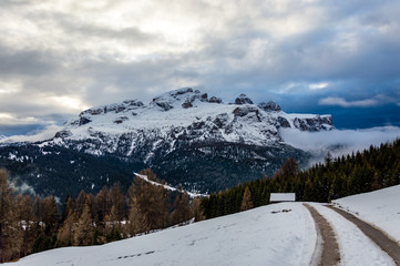 Beautiful view at the alpine village Corvara ski resort in Dolomites mountains, Alps region, Italy