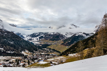 Beautiful view at the alpine village Corvara ski resort in Dolomites mountains, Alps region, Italy