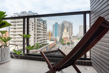 Chair and view from the balcony in Taiwan - 214357107