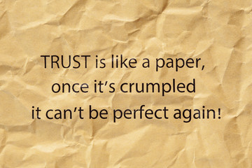 Fototapeta na wymiar Trust Is Like A Paper Once Its Crumpled