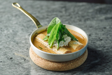 cannelloni on a plate with meat