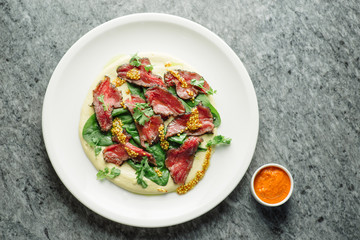 meat salad with spinach