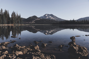 Pristine early morning reflections in Central Oregon's Cascade Lakes Wilderness