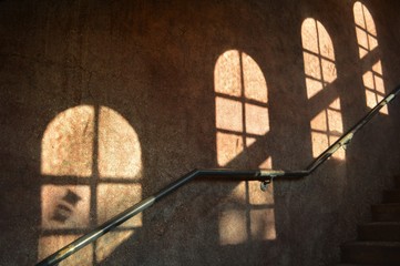 Soft Silhouette of Windows on a Wall with Sunlight and Shadow