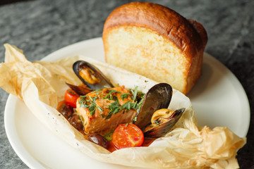 salmon with mussels and vegetables
