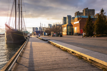 Boardwalk on Toronto Waterfront Lit by an Autumnal Setting Sun. ON, Canada. 