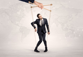 Puppet man with big city great power concept
