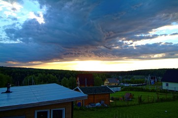colorful summer sunset in the countryside