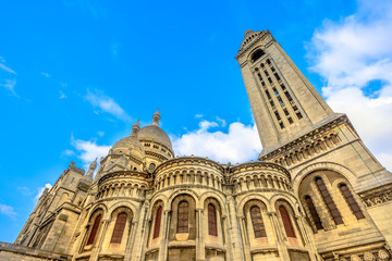 Back side of Sacre Coeur Basilica de Montmartre in a beautiful sunny day with blue sky. Sacred...