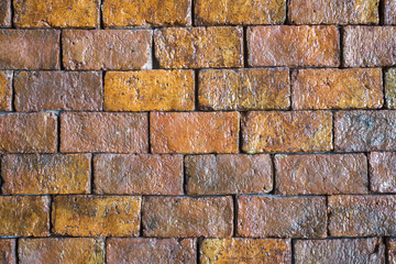 textured decorative orange brick wall. background