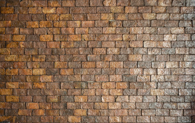 textured decorative orange brick wall. background