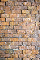 textured decorative orange brick wall. background