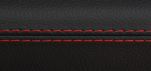 Naklejka premium strzał zbliżenie czarny skórzany fotelik samochodowy z czerwonym ściegiem, luksusowy samochód sportowy
