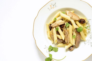 Pasta with chicken and mushrooms, top view, copy space