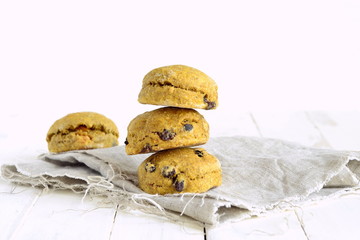 Pumpkin scones with dried fruit for breakfast, copy space