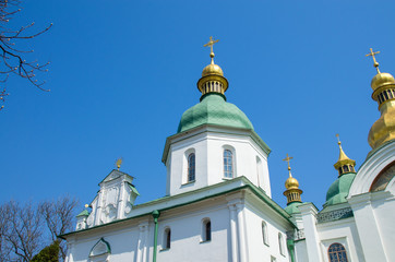 Fototapeta na wymiar Orthodox Church with golden rooftops