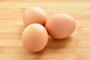 Chicken eggs on the table.