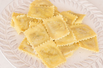 Ravioli with butter.