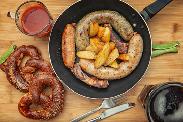 Sausage grill in a cast iron pan