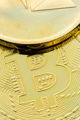 cryptocurrency golden coins - Bitcoin, Ethereum with black background. Virtual money concept.