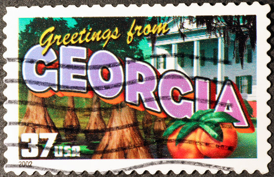 Greetings from Georgia postcard on stamp