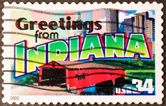Greetings from Indiana postcard on stamp