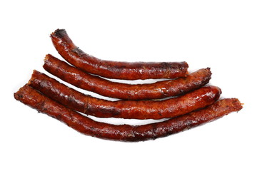 Fried sausages isolated on white background, top view