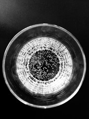 Glass of sparkling water top view
