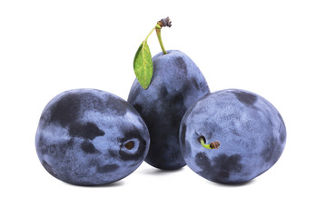 three blue ripe plums