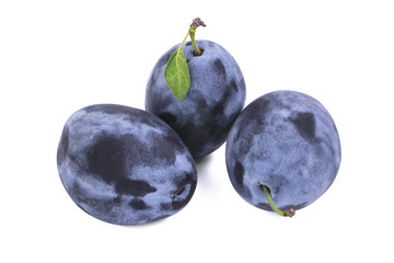 three blue ripe plums