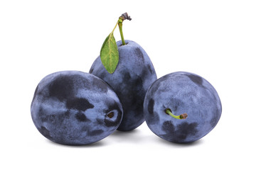 three blue ripe plums