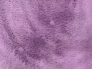 Fluffy wool purple texture.