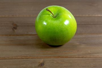 Tasty Green apples on a kitchen counter