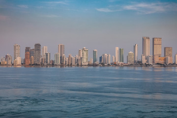 Obraz premium White Buildings of the Cartagena Skyline on a hazy Day