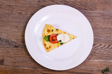 Pizza Caprese with basil