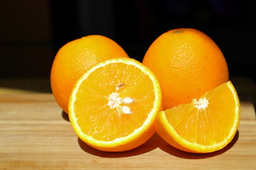 oranges on black background