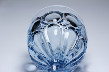 Macro abstract of elegant blue crystal glass with scallop designs