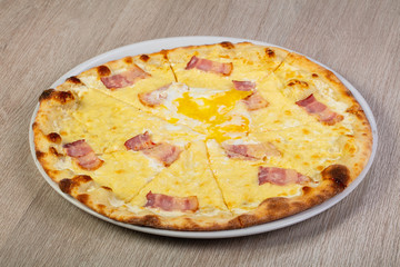 Pizza carbonara with bacon