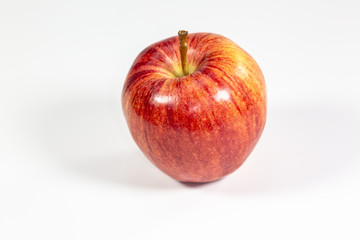 Red apples waiting to be eaten on the kitchen table
