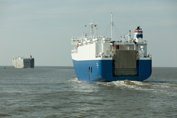 industrial ships, ocean horizon, leaving the port